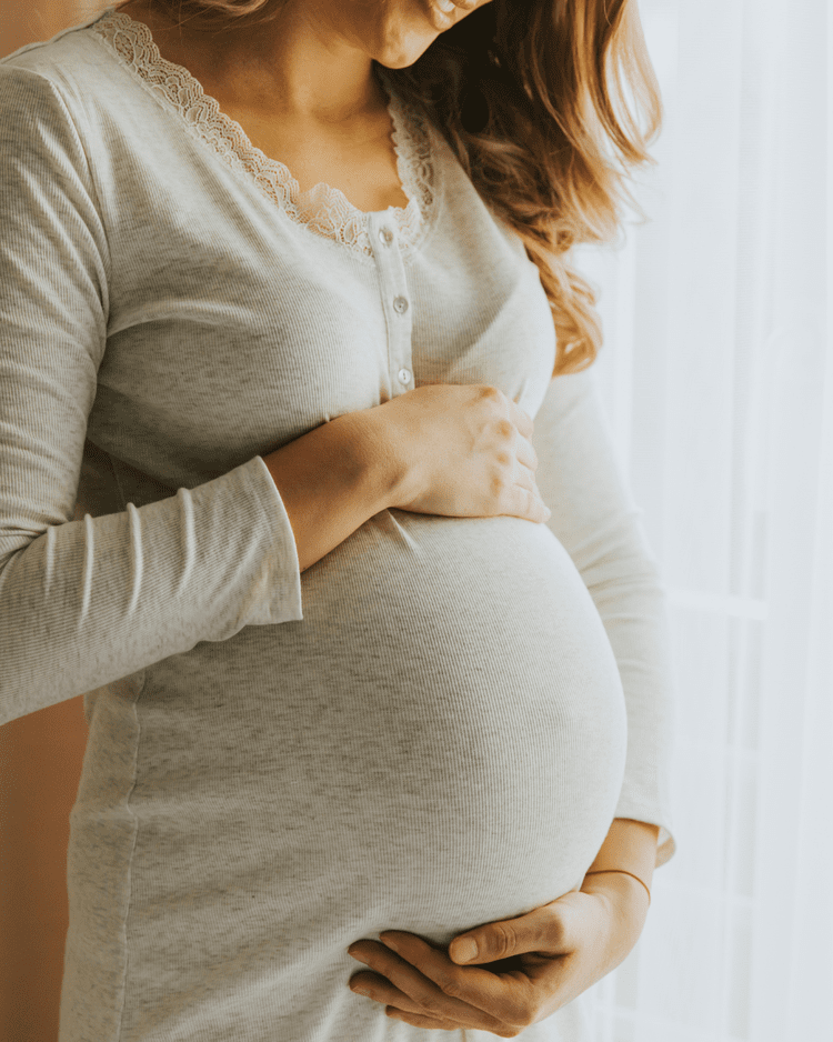 Déroulement soin femme enceinte Lyon — massage prénatal Un Moment Suspendu