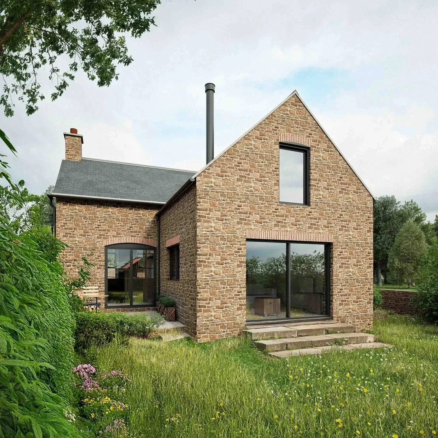 Two-story natural stone residential rear extension and renovation of a historic converted old school building in Clevedon.