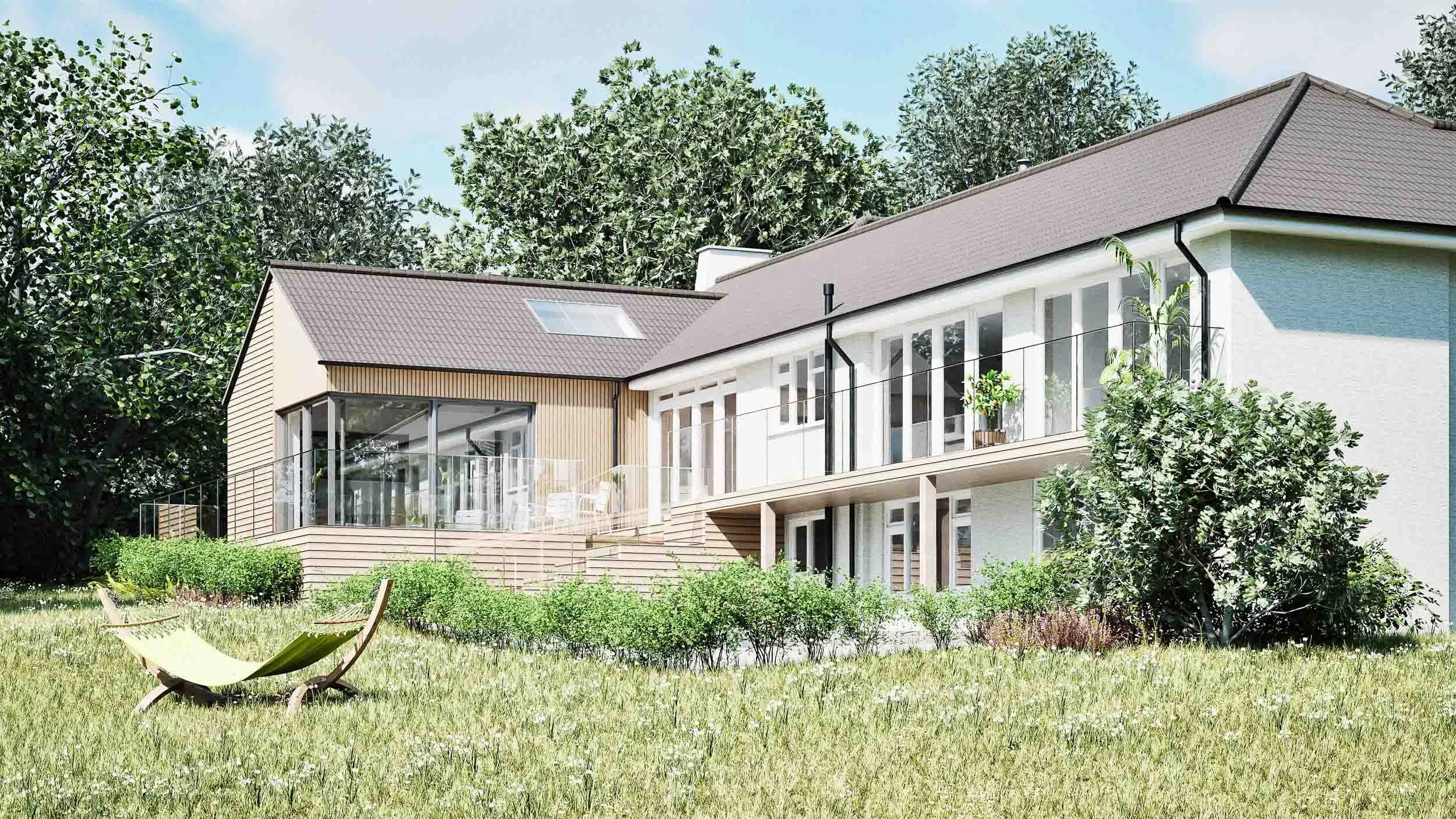 The new elevated deck and frameless glass balcony look out over the sloping lawn.