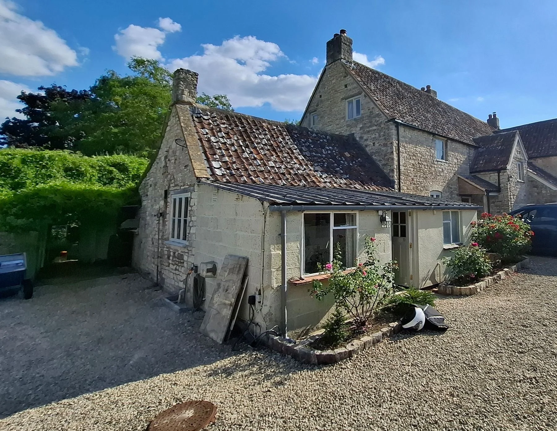 'Before' photograph showing the existing utility room to be replaced