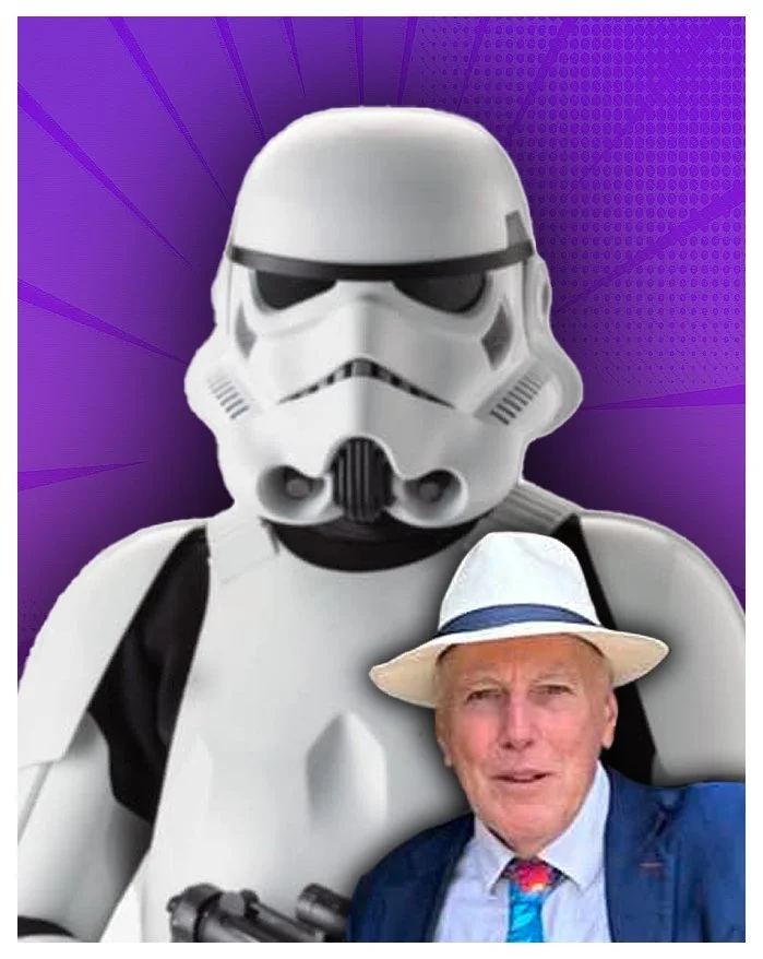 A person dressed as a stormtrooper from Star Wars standing next to a man wearing a white fedora, blue suit, and colorful tie, with a purple background.