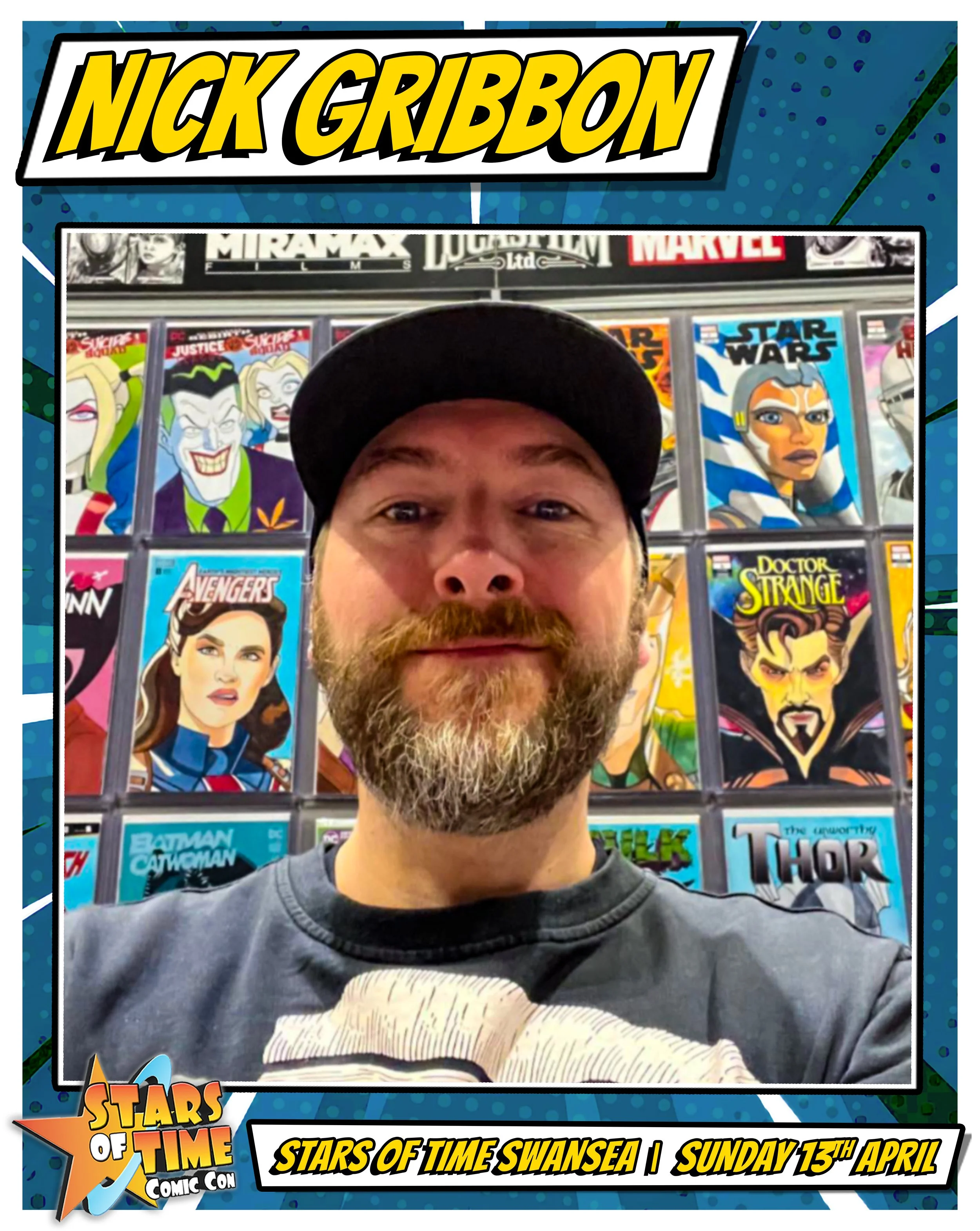 A man with a beard taking a selfie in front of comic book covers including Batman, Doctor Strange, Thor, and Marvel characters at Stars of Time Comic Con in Swansea on Sunday, April 13th.