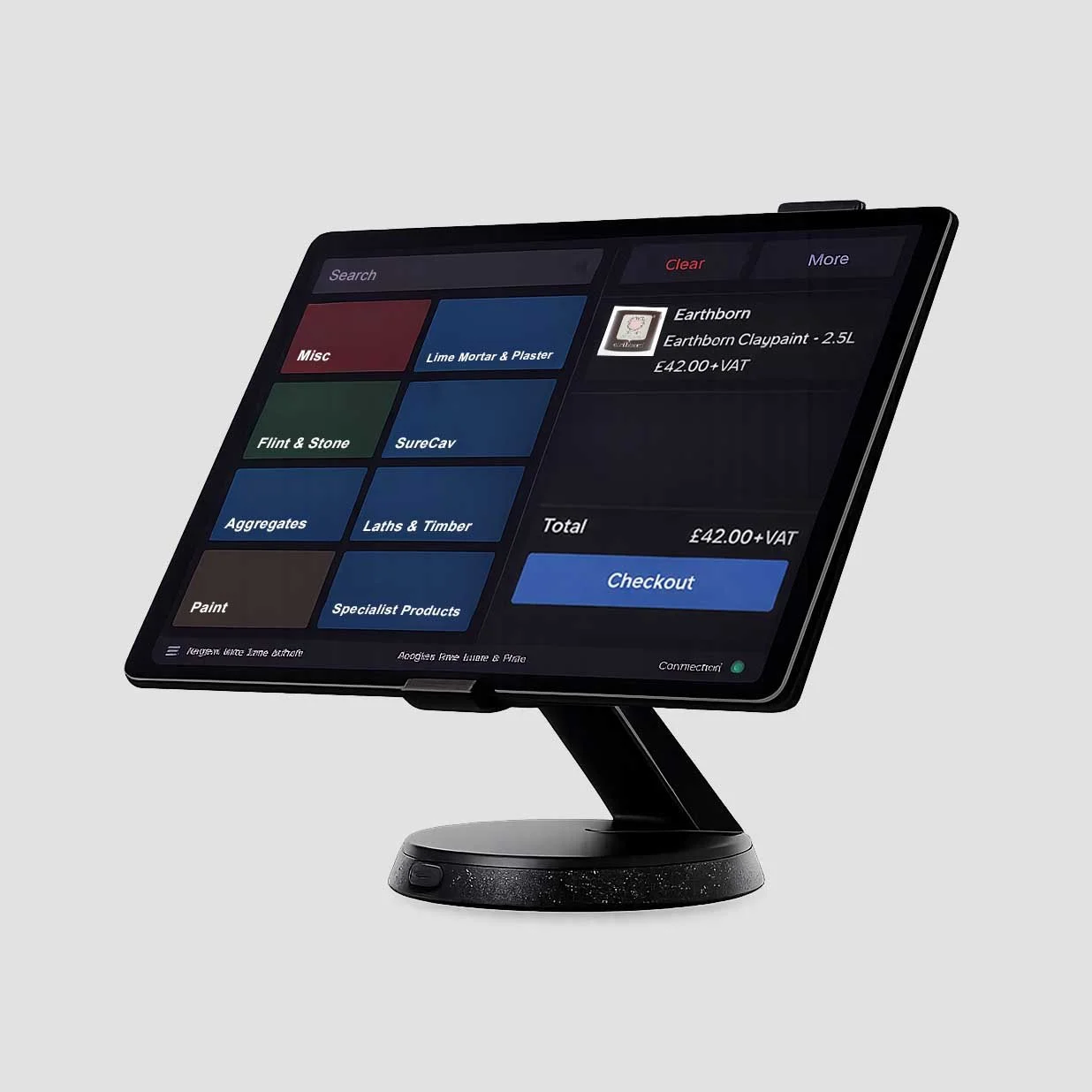 A digital point-of-sale terminal with a touchscreen monitor displaying an order for Earthborn clay paint, priced at 42 pounds plus VAT, with a checkout button below.