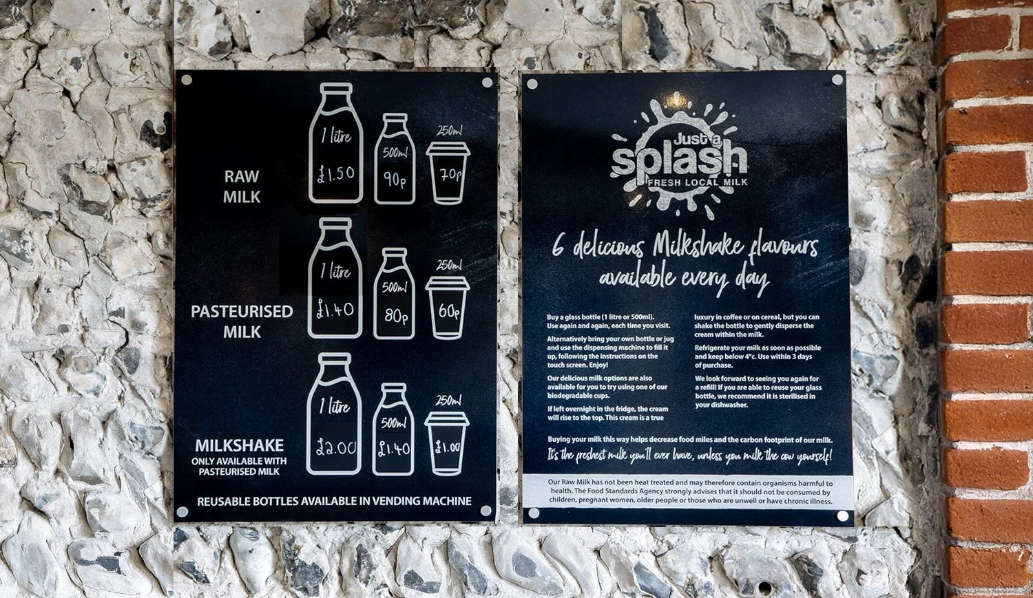 Signage on a wall displaying milk prices and options for raw milk, pasteurized milk, and milkshakes. The prices are listed for different bottle sizes and the signs include instructions and information about milk options and environmental consideratio