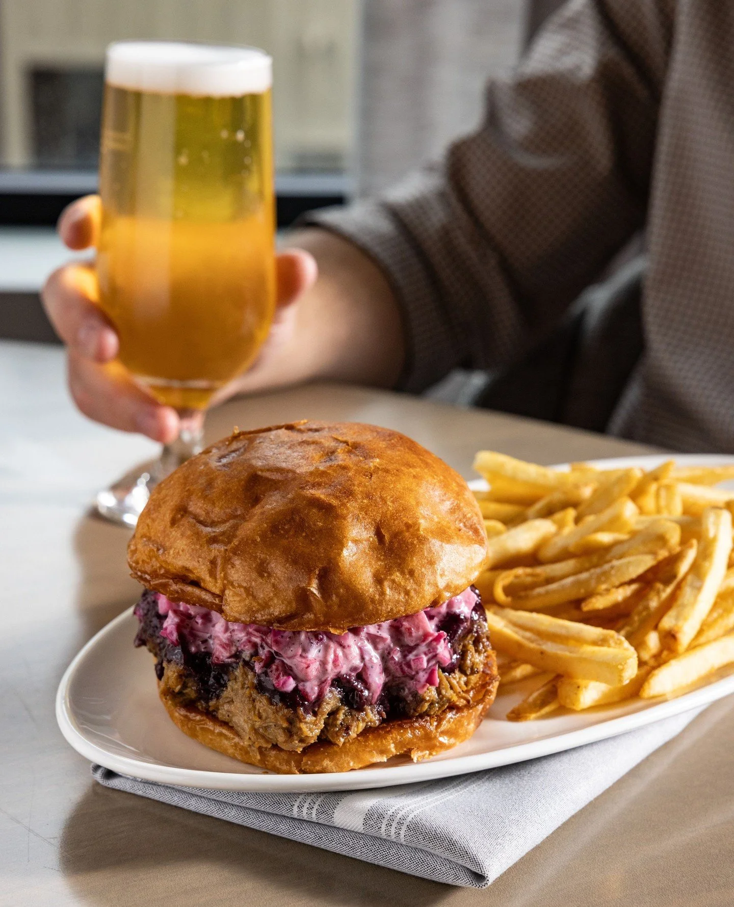 Twice as good 🍔🍺⁠
One handheld + one domestic bottle for $22. Available Monday&ndash;Friday.