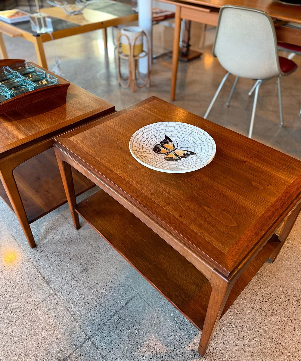 Vintage Mid-Century Modern Walnut Side Tables | Design Culture GR. Beautiful vintage mid-century modern walnut side tables featuring warm wood tones, clean lines, tapered legs, and practical lower shelving.