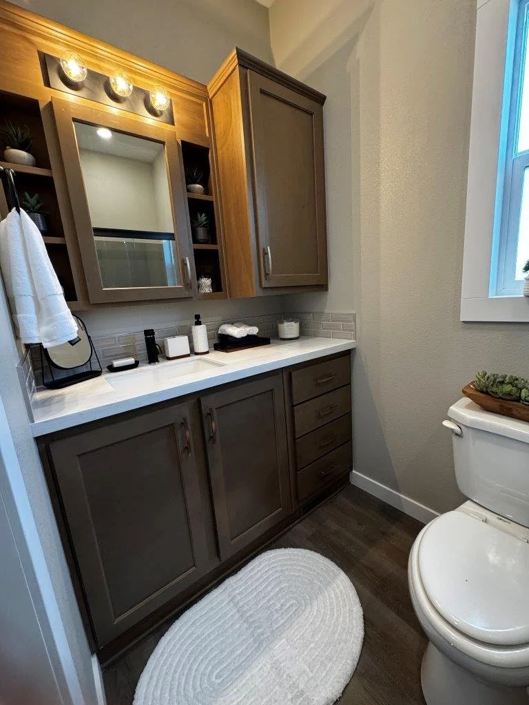 Bathroom Style Tiny Home Cabinets over countertop