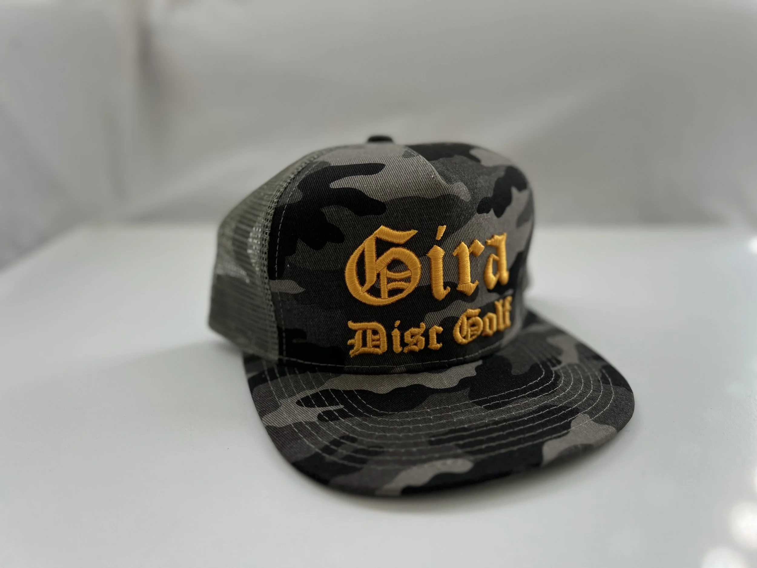 Mesh Trucker 5 Panel- Black Green and Gold Camo “Cerro”