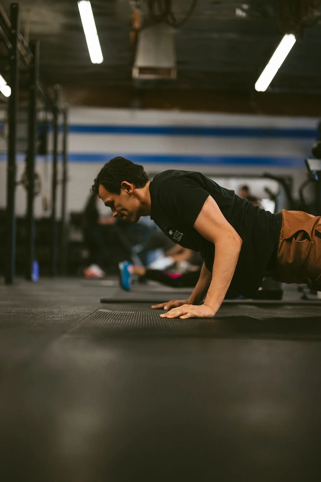10-9-8-7-6-5-4-3-2-1
Deadlifts (185/125)
Push Ups
Toes to Bar

Hard but sustainable effort that rewards quick transitions and smart break strategies.

photo credit: @johnshootsit