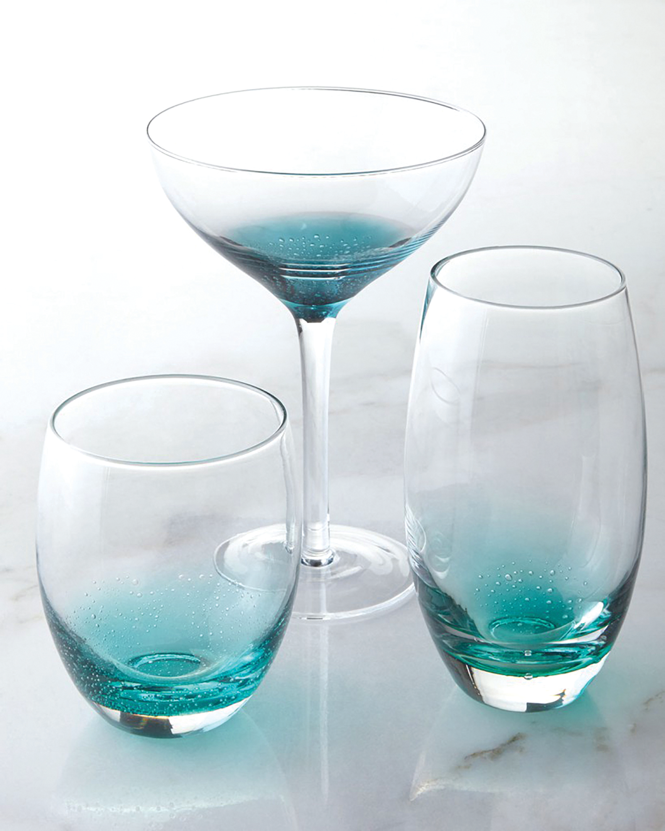  The  Nassau Rocks Aqua  boasts beautiful, hand-blown weighted glassware with modern pops of colour and texture; perfect for everyday use.  www.althompson.com  