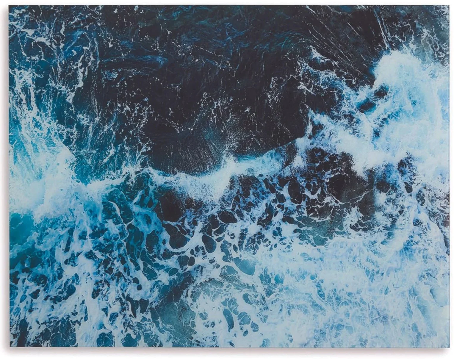  Waves frozen in time, the  Clemick  print on glass brings the ocean indoors – effortless, serene and utterly mesmerising.  