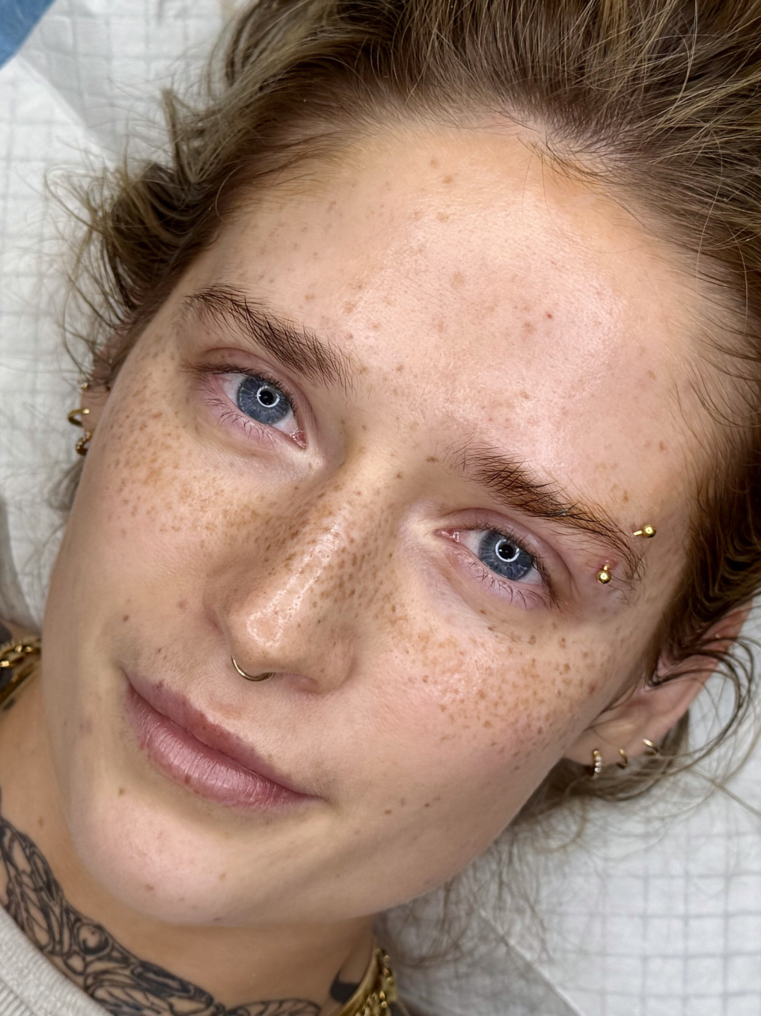 natural freckle tattoo