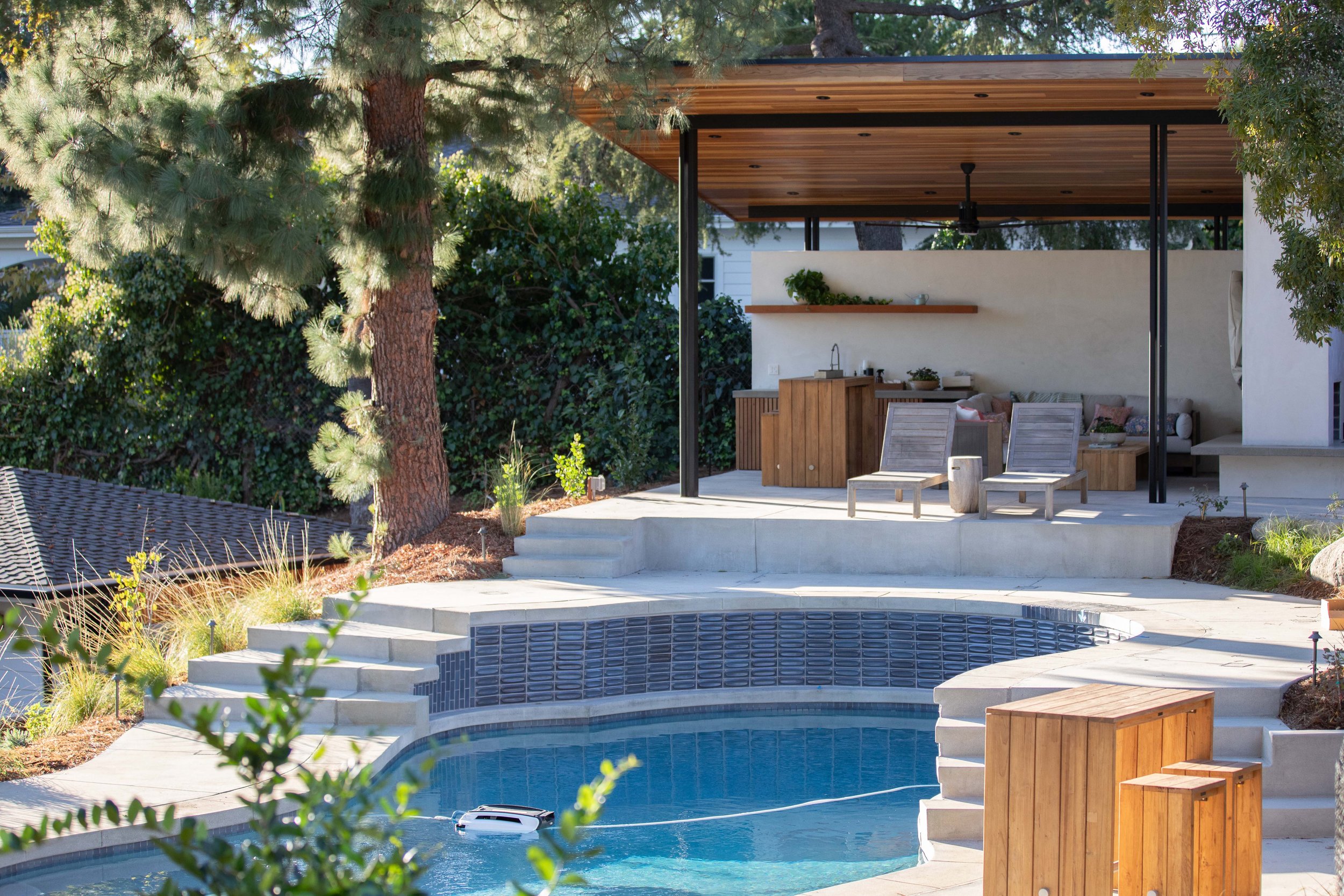 Cedar pavilion and swimming pool, native grass planting, La Cañada Flintridge residential garden, CRAFT Landscape Architecture