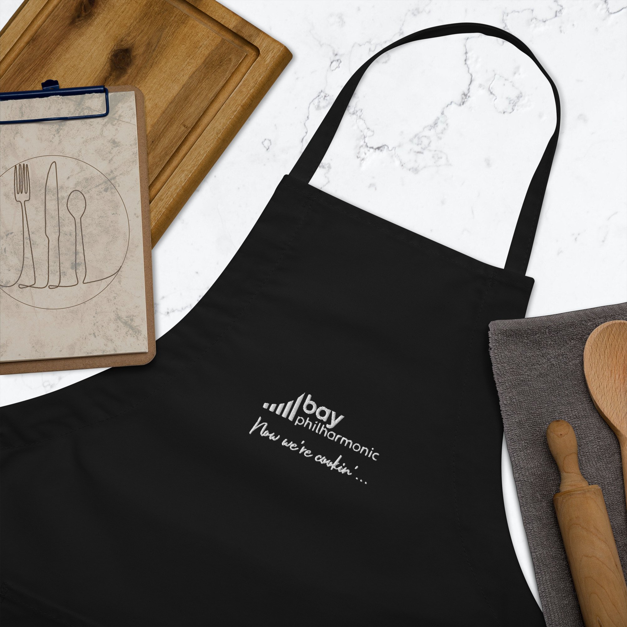 embroidered-apron-black-zoomed-in-6395043daa207.jpg