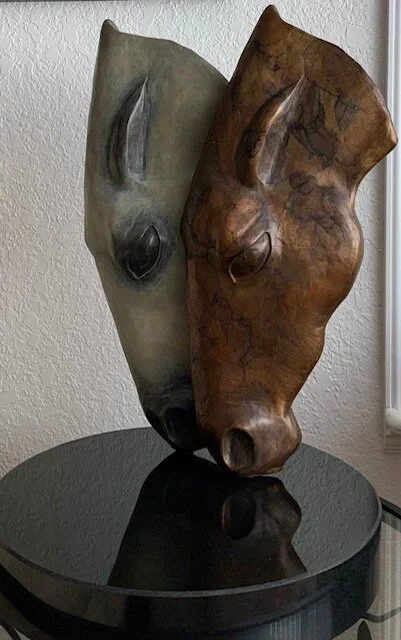 Horses bronze relief.webp
