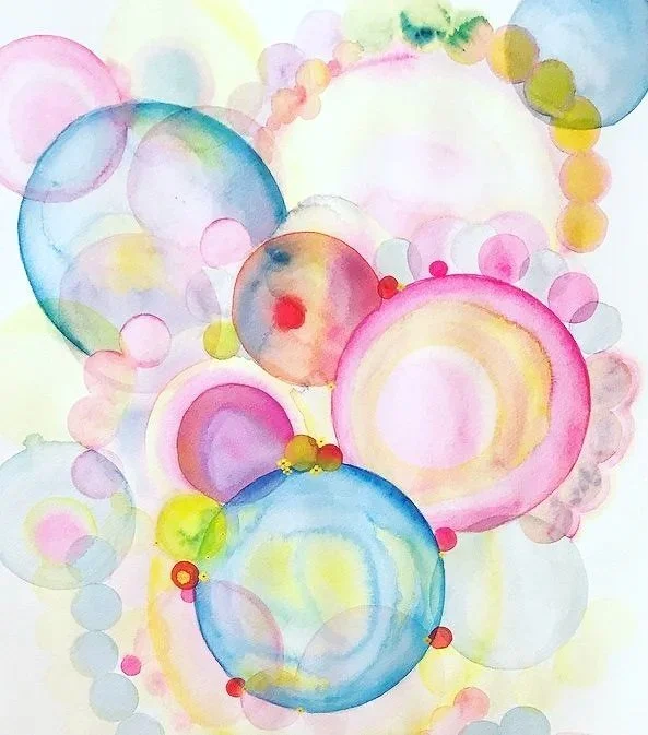 Watercolor painting of various overlapping circles in soft pastel colors including pink, blue, yellow, purple, and green. Part One of the Intuitive Art as Medicine eCourse.