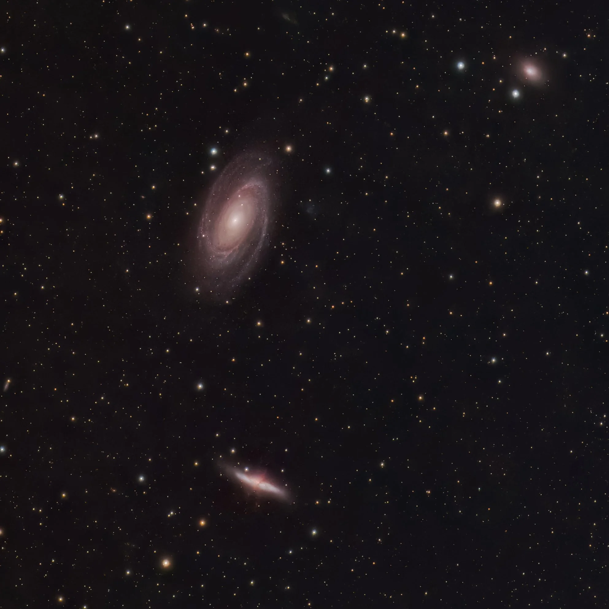 Bode's (Messier 81) and Cigar (Messier 82) galaxies. These objects are approximately 12 million light years away from Earth in constellation of Ursa Major. 