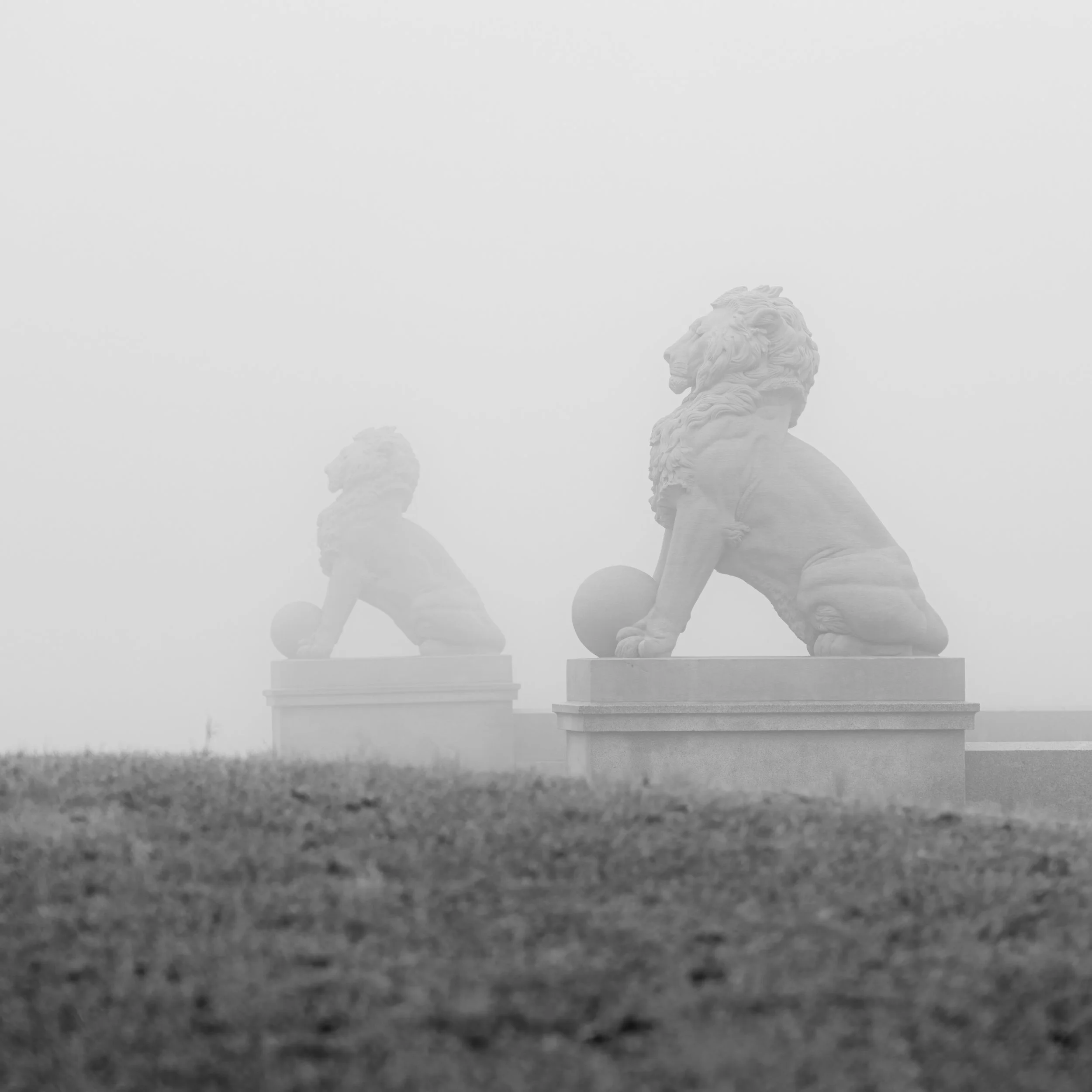 Stone Lions enveloped in fog. Lions bridge, Newport News, Virginia.