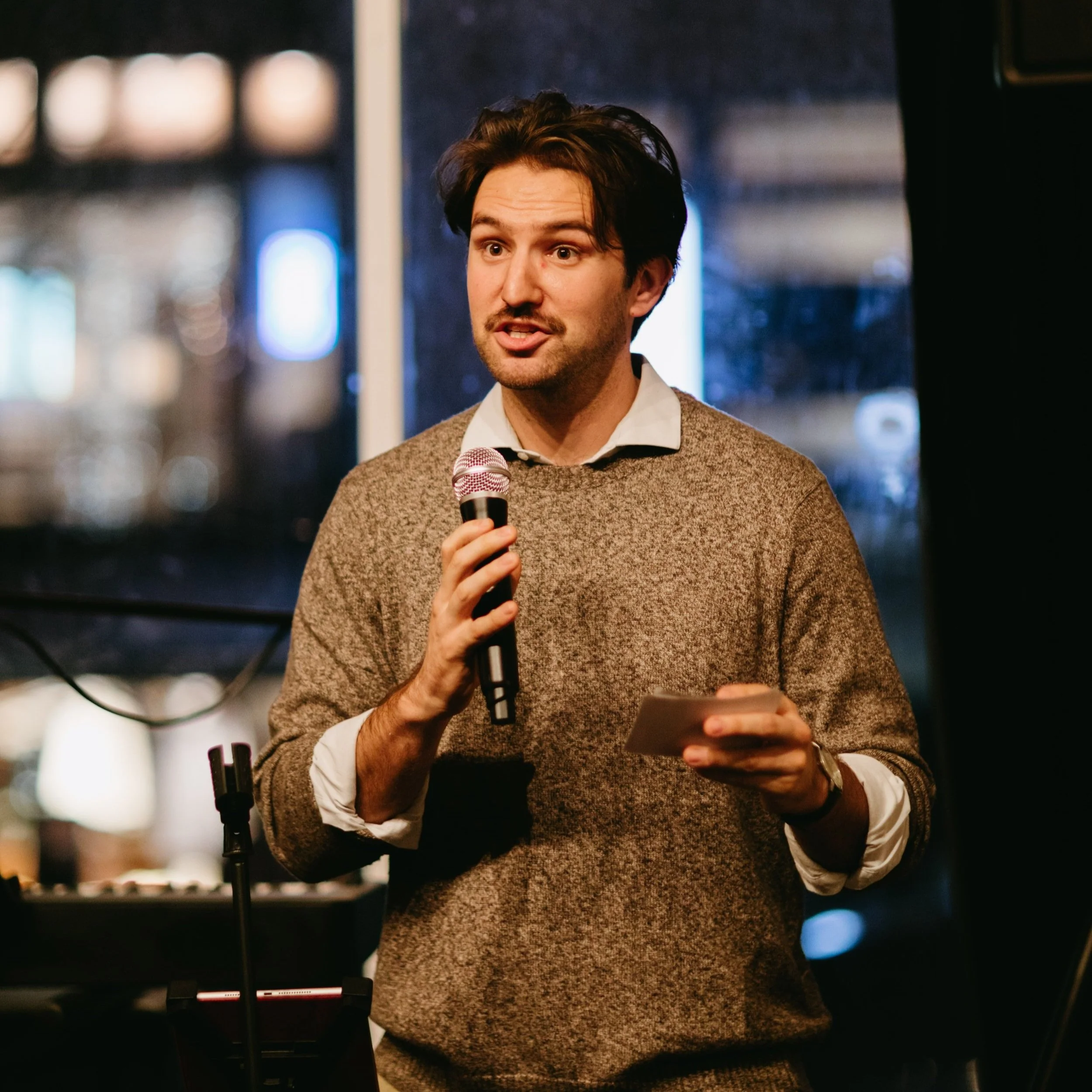 Well Dressed Man giving speech at fundraiser