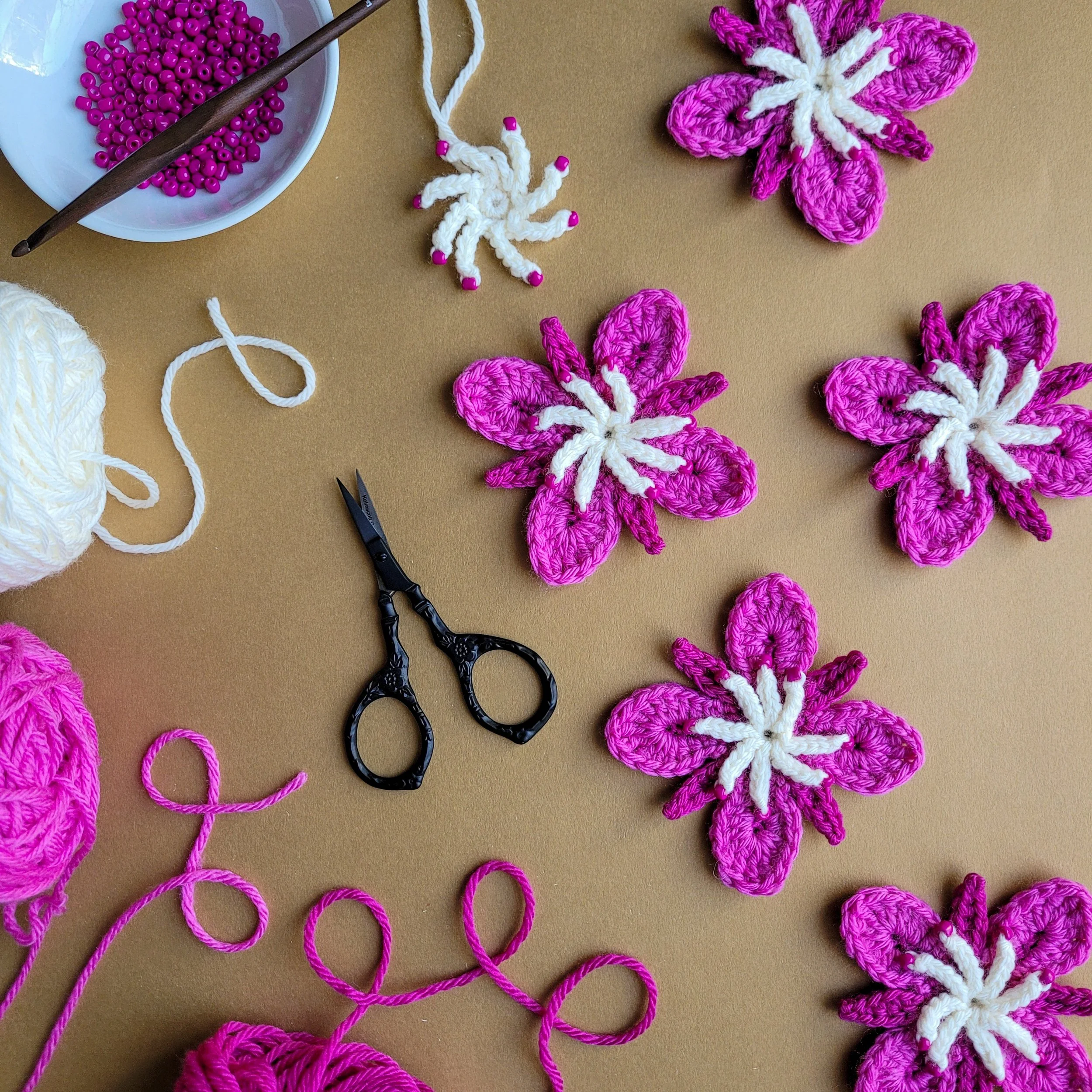 crochet fireweed flowers, yarn, and beads
