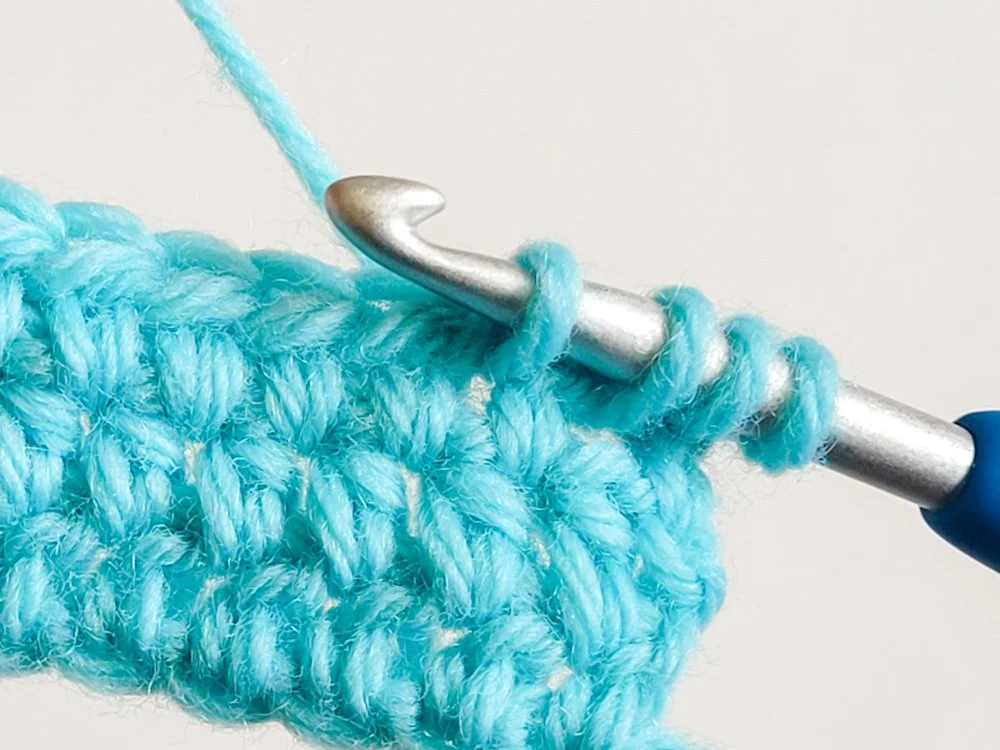 Four loops on crochet hook.