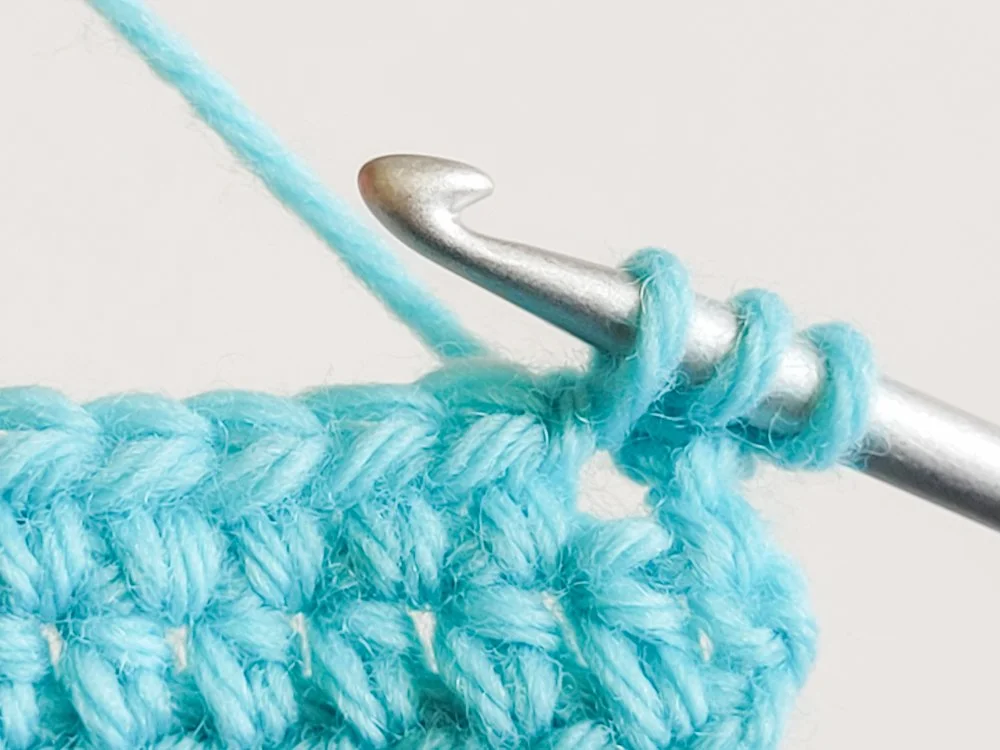 Three loops on the crochet hook.