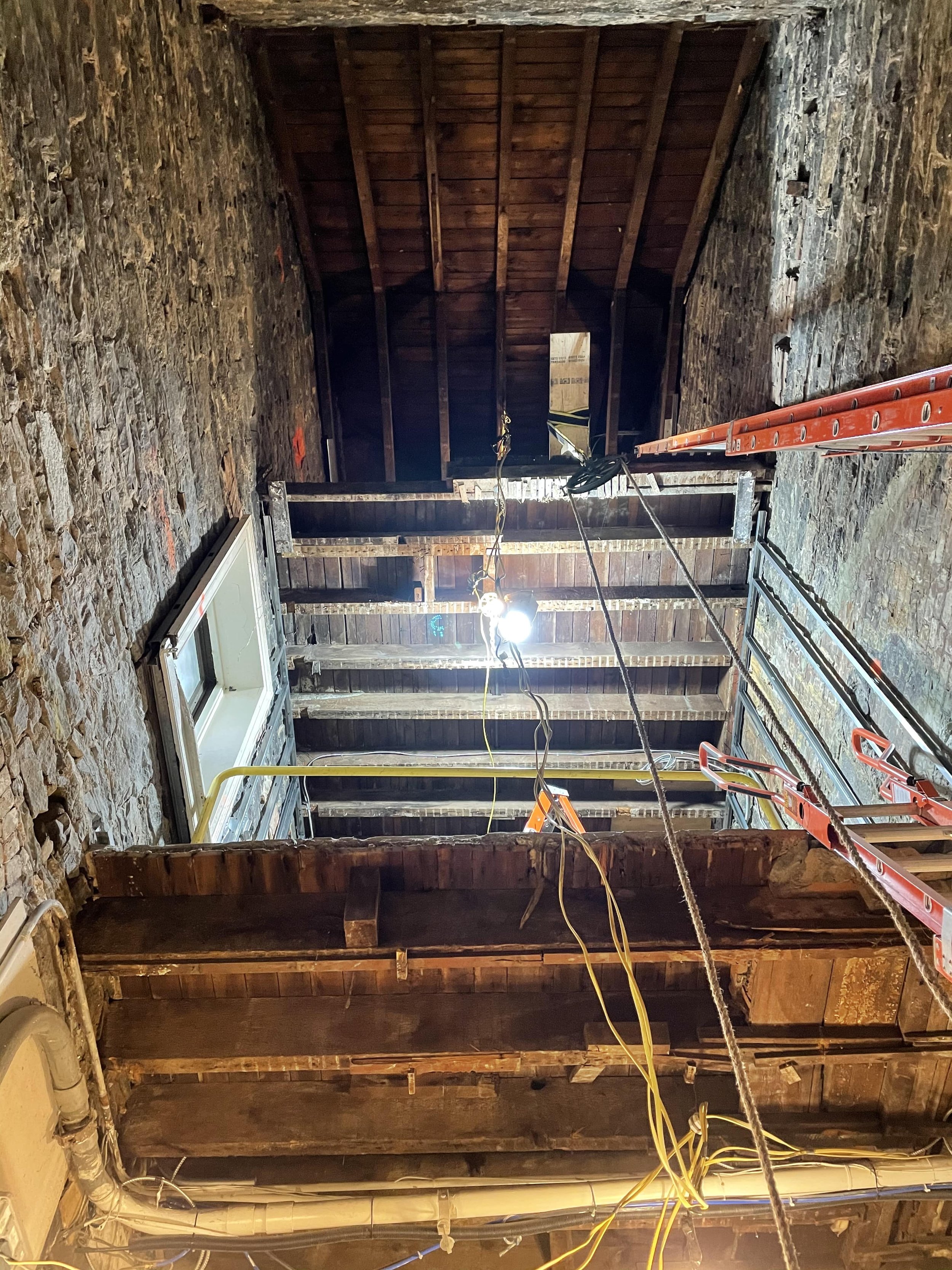 Interior - exposed brick & wood structure
