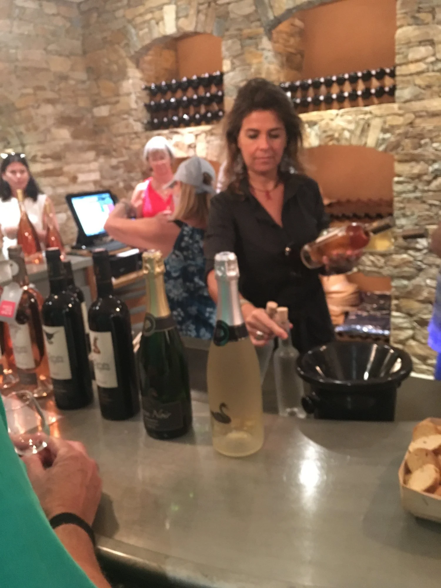  Wine tasting. &nbsp;This lady is one of the family members who runs the winery. 