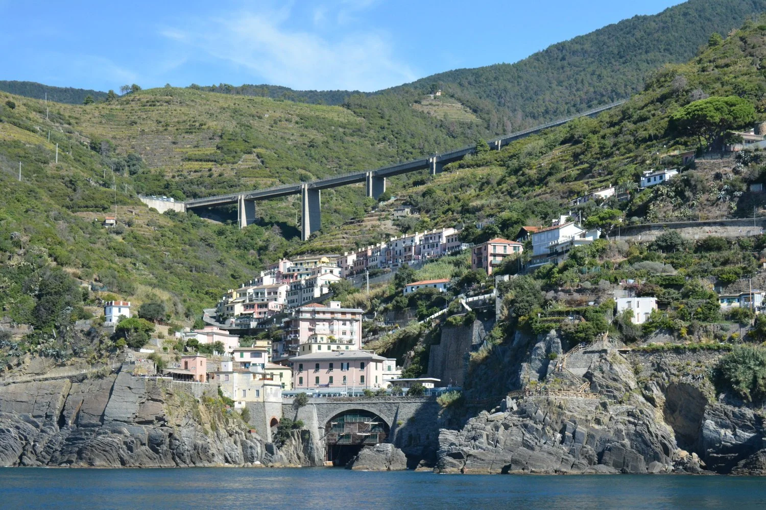 In the 1970’s a road was built connecting the towns. &nbsp;It is higher than the towns so you must hike in. &nbsp;Railroad track is the lower bridge and does go through towns and through the rock mountain. Porto Venere. 