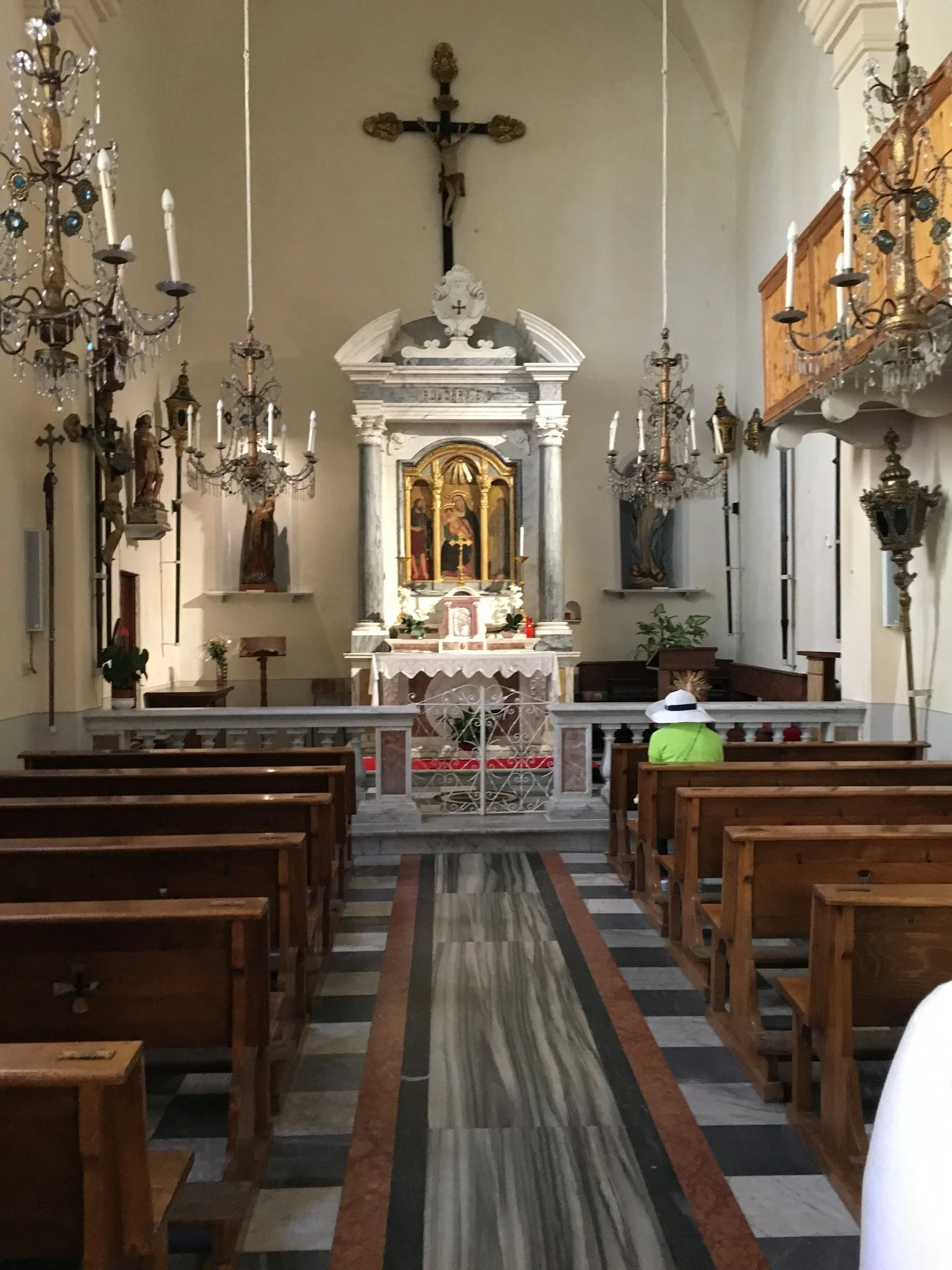  Typical inside of a church. Inlaid marble floors, stucco walls alter and icons in marble or wood. &nbsp;Riomaggiore church. 