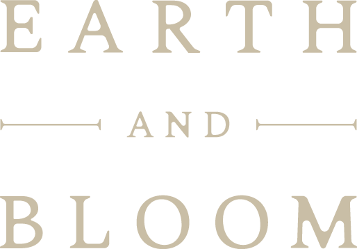 Poster or book cover with the title 'Earth and Bloom' in a vintage style font.