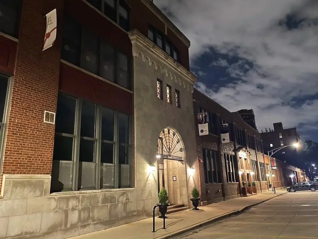 InnerBloom Therapy Practice office building brick exterior in Chicago, IL at night