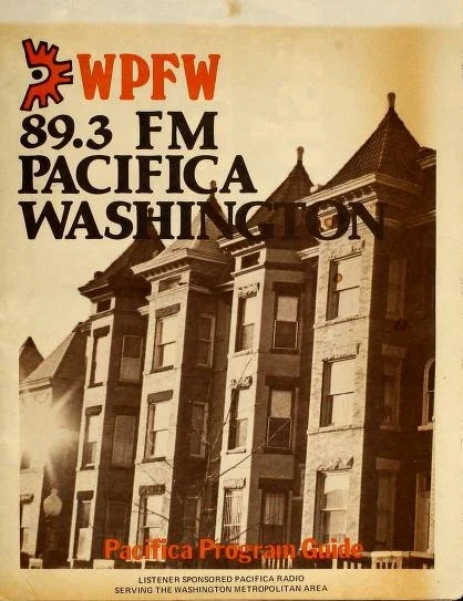 A poster for WPFW 89.3 FM Pacifica Washington radio station featuring an illustration of a historic building with peaked roofs, with the station's logo and name in large red and black letters, and the text 'Pacifica Program Guide' at the bottom.