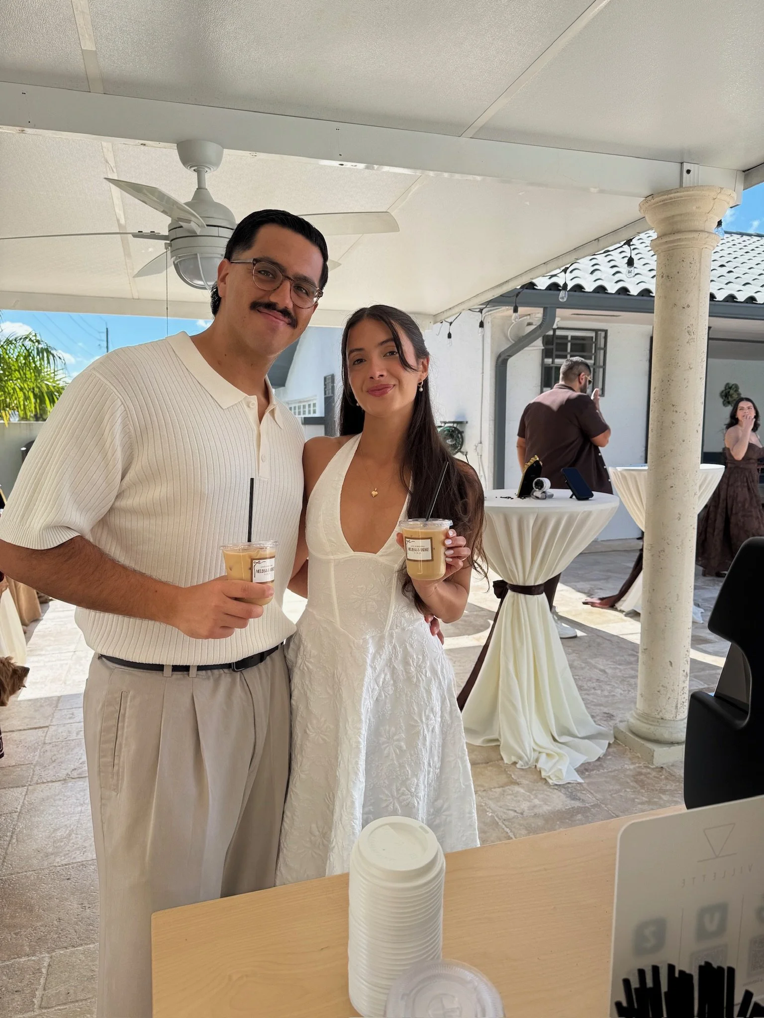 Guests enjoying specialty coffee drinks from Villette Coffee Cart at a Miami social event