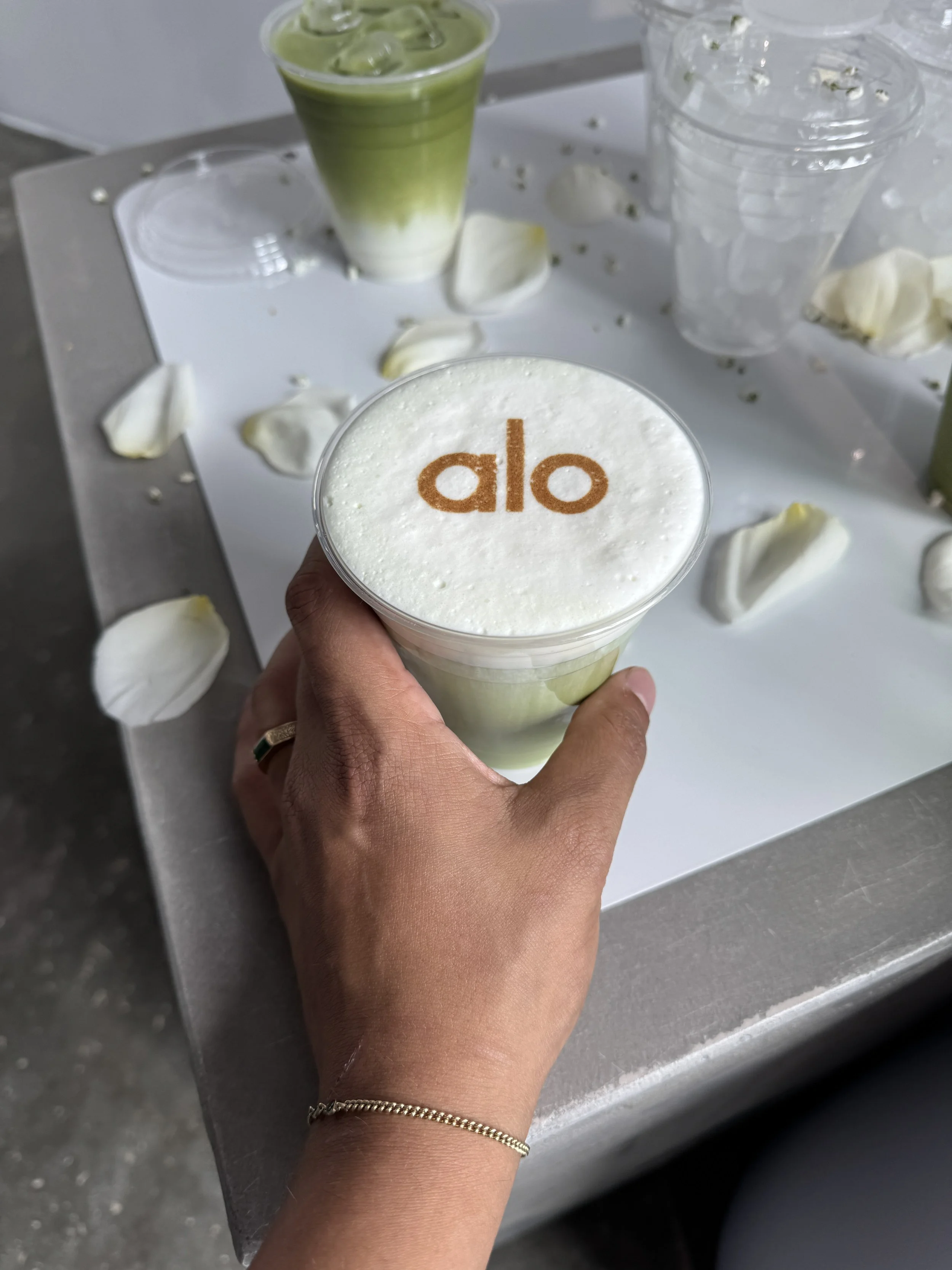 Branded matcha latte served for Alo activation by Villette Coffee Cart in Miami
