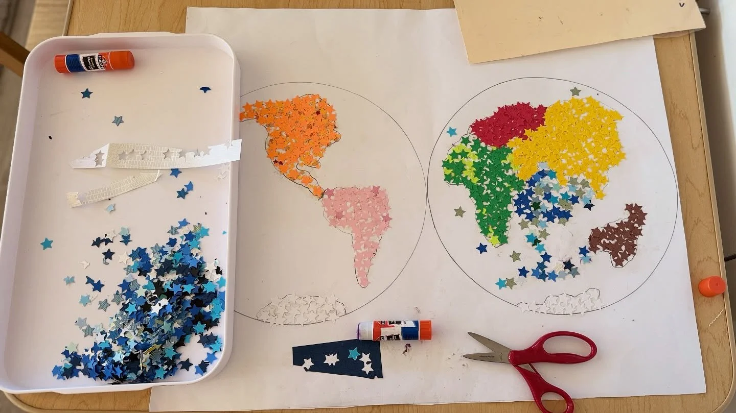 ✨ At the Primary level, even the world can be built one tiny piece at a time. One student carefully created this Montessori world map using little stars of construction paper &mdash; a beautiful reminder that even our youngest learners can make somet
