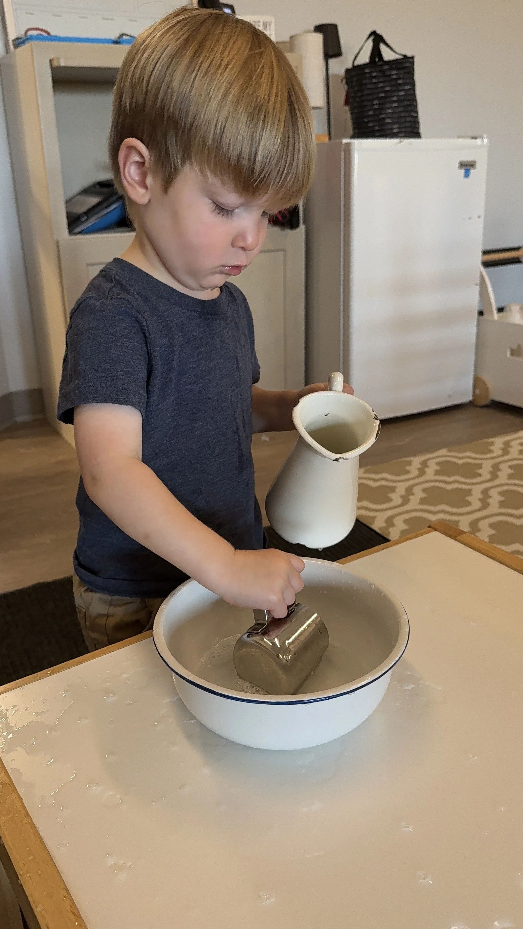 Montessori toddler pouring practical life