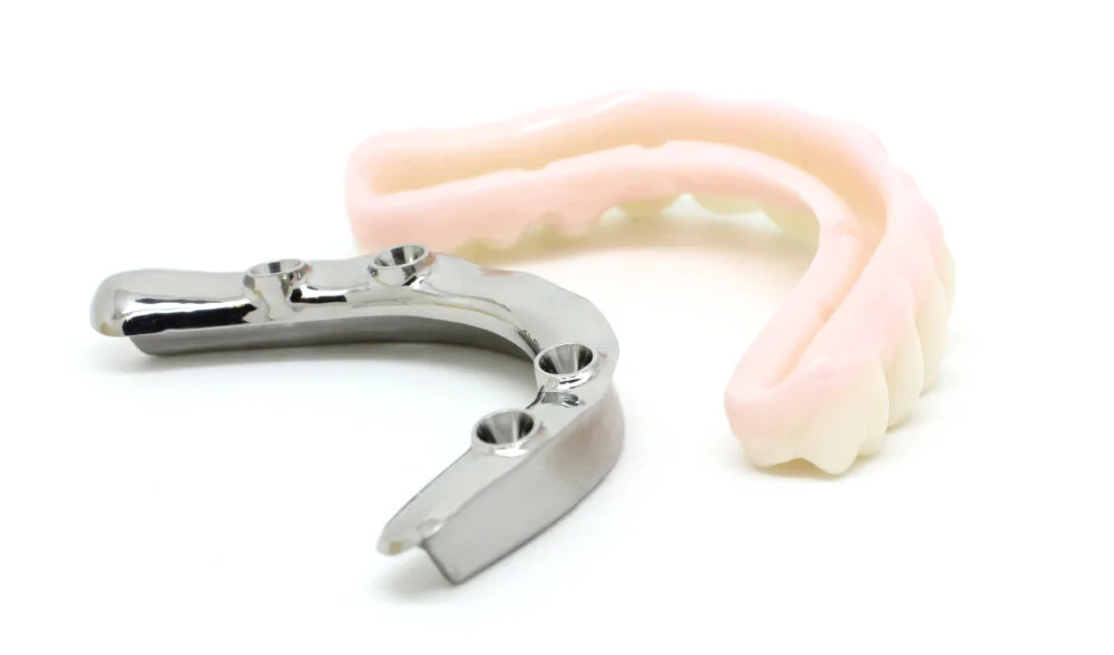 Nexus Hybrid prosthesis bar and overlay on white background.