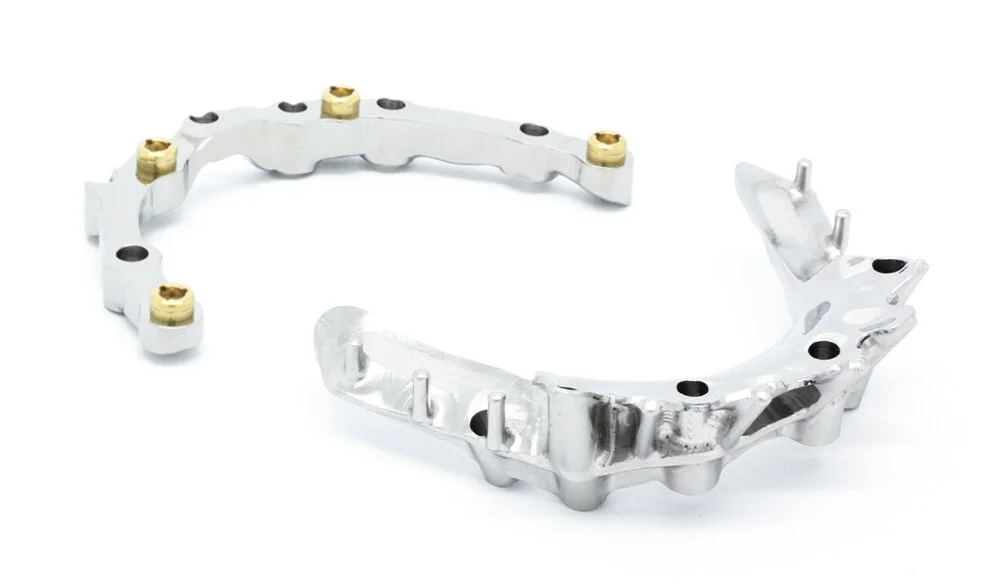 Examples of full-arch prosthetic frameworks. A removable primary bar and a Melbourne bar.