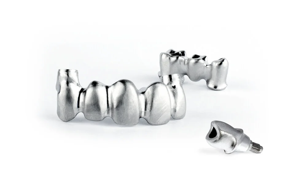 Anatomical bridges in Cobalt Chrome (CoCr) and a single-tooth abutment.