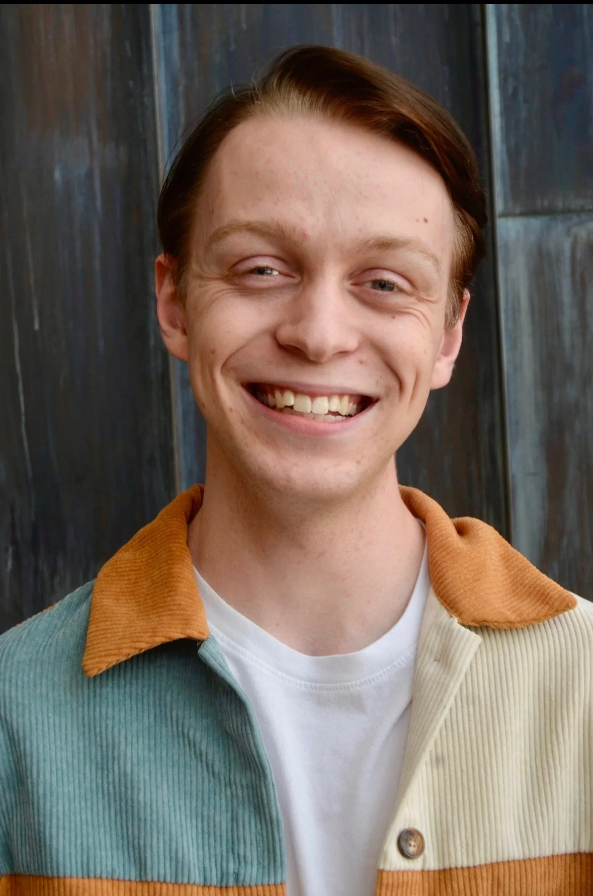 Headshot Brown Smile.JPEG