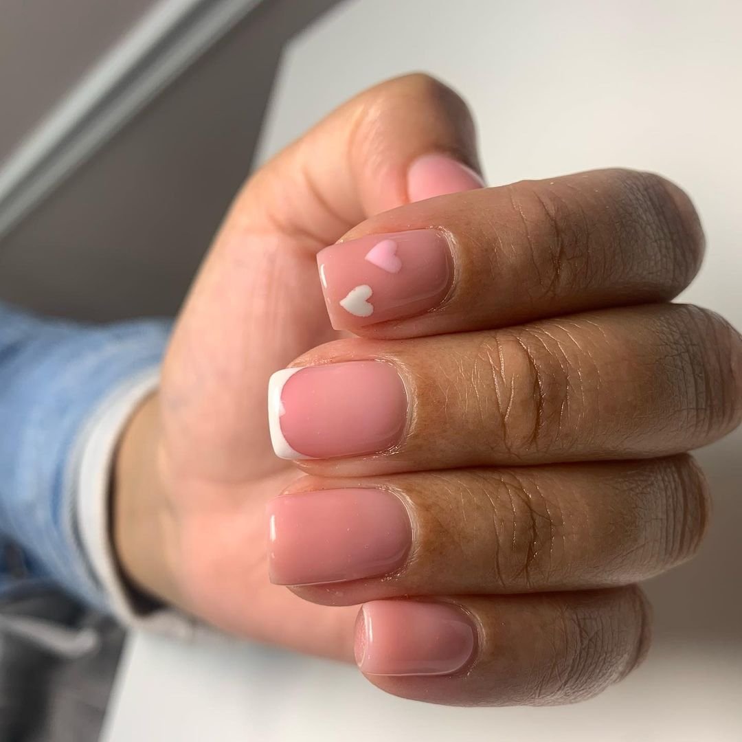 Salon claws! Clear acrylic overlay with clear topcoat. Not brave enough for  a real color, but clear is polish. They feel indestructible (I know better  though). Typing skills deminshed but worth it. :
