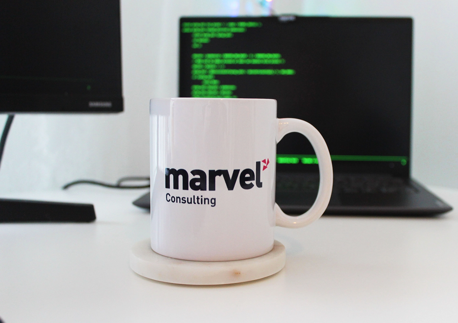 mug with the marvel consulting logo