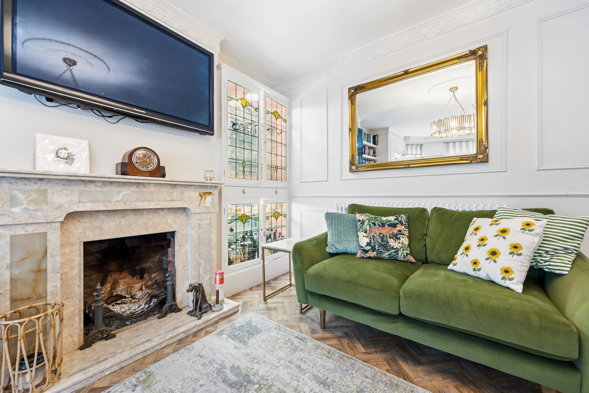 Sitting Room - fireplace and display cabinet.jpg