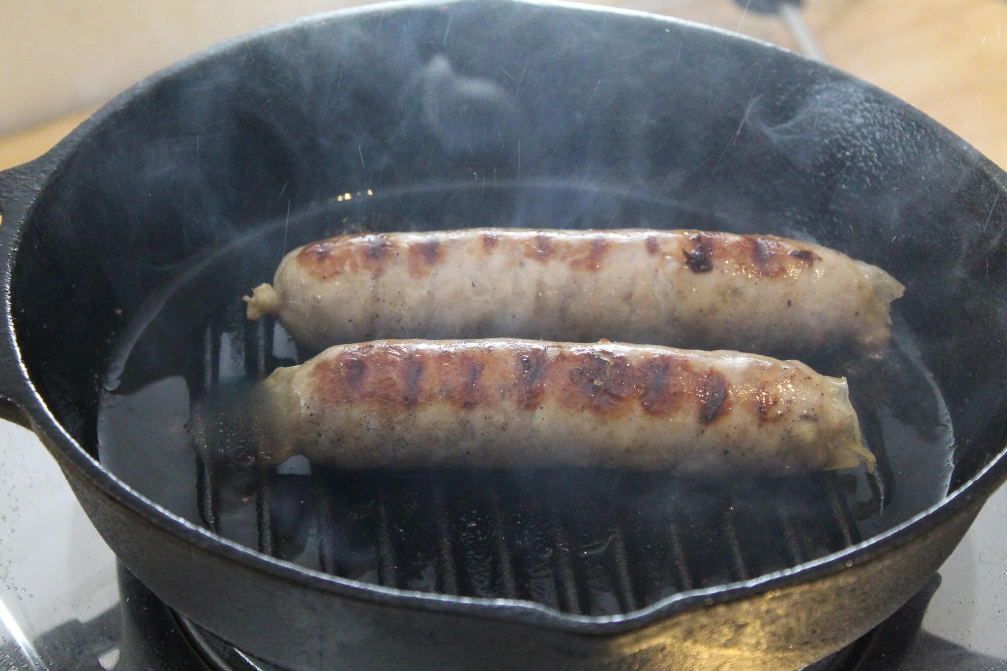 Cast Iron Brats with Peppers and Onions - Fresh Off The Grid