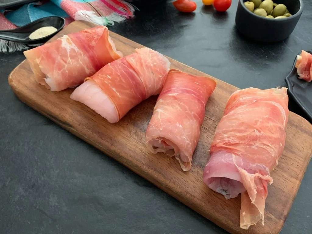Cod Wrapped in Parma Ham with Cherry Tomato and Olive Traybake Recipe