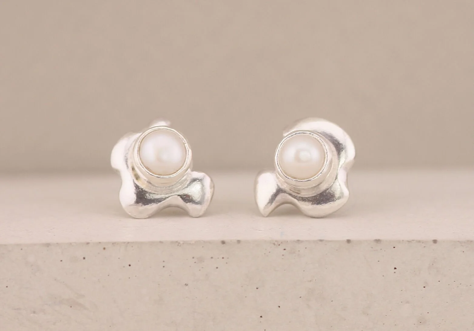 sterling_silver_abstract_surrealist_pearl_earrings.jpg