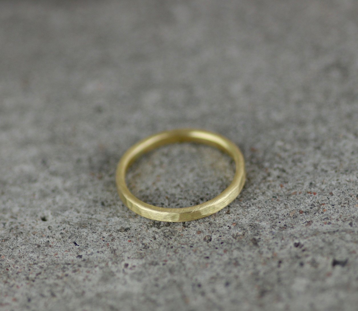 Marcia+Vidal+hammered+18ct+gold+wedding+ring+brushed.jpg