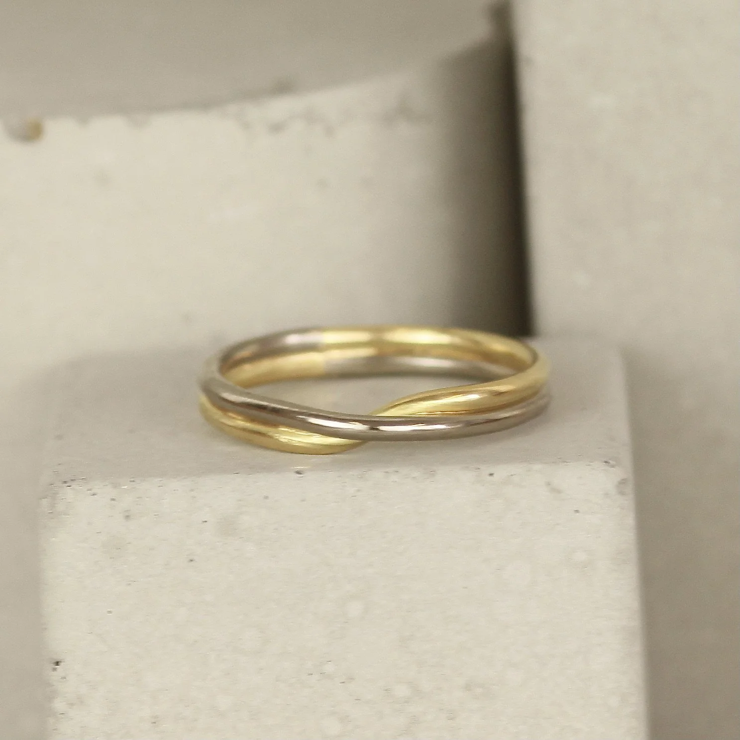 18ct+recycled+yellow+and+white+gold+mobius+ring.JPG