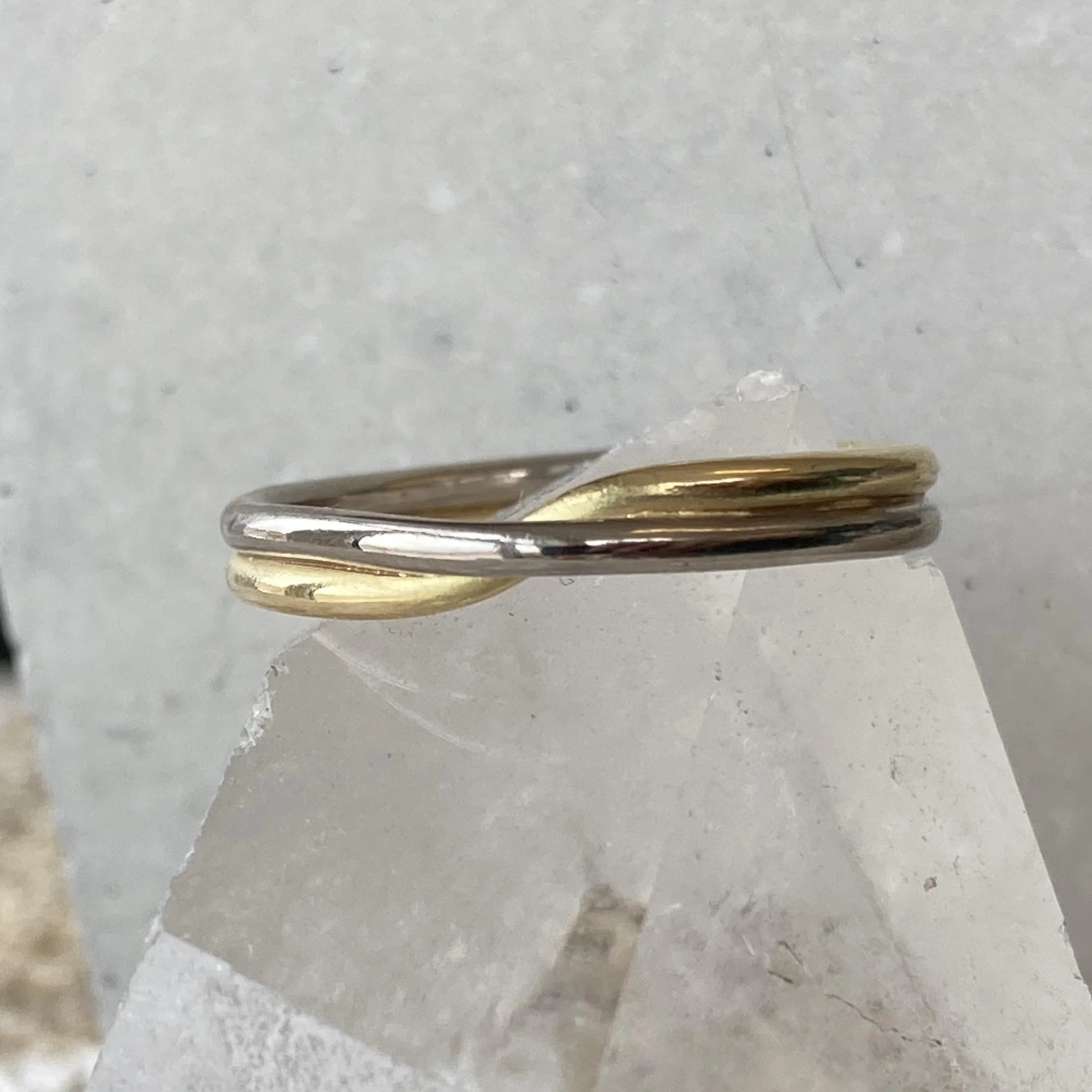 18ct+yellow+and+white+gold+twist+mobius+ring.jpg